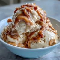 Creamy peanut butter banana ice cream made with ripe frozen bananas and natural peanut butter. A healthy, dairy-free dessert perfect for hot summer days.